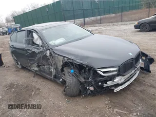 2022 BMW 5 Series M550i xDrive with VIN WBA13BK01NCH76521, listed as a IAAI auction lot 41904437 with Not provided miles and . Bid and sale history available at DreamBid. Image 1.