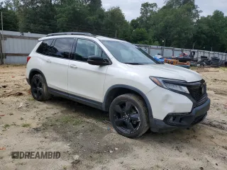2019 Honda Passport Elite with VIN 5FNYF8H00KB005305, listed as a Copart auction lot 63369345 with 49,267 mi miles and Salvage title. Bid and sale history available at DreamBid. Image 4.