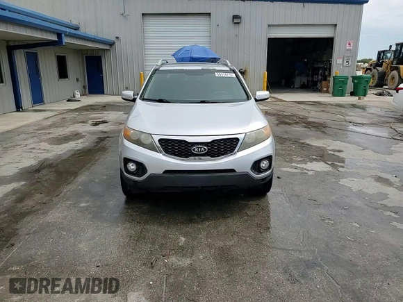 2012 Kia Sorento EX z VIN 5XYKU4A27CG229651, wystawiony jako Copart lot #60314715 z przebiegiem 117 876 mil mil oraz Szkoda całkowita • Salvage title. Historia ofert i sprzedaży dostępna na DreamBid. Obrazek 15.
