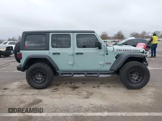 2023 Jeep Wrangler Rubicon with VIN 1C4JJXFG7PW654564, listed as a IAAI auction lot 41833534 with 22,277 mi miles and . Bid and sale history available at DreamBid. Image 13.