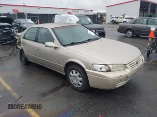 1997 Toyota Camry LE z VIN 4T1BG22K9VU786181, wystawiony jako IAAI lot #41610928 z przebiegiem 338 829 mil mil oraz . Historia ofert i sprzedaży dostępna na DreamBid. Obrazek 1.