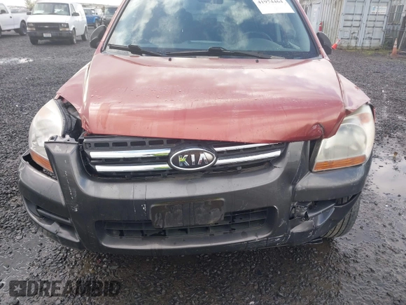 2006 Kia Sportage LX with VIN KNDJE723167159809, listed as a IAAI auction lot 41974464 with 130,822 mi miles and . Bid and sale history available at DreamBid. Image 6.
