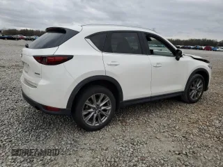 2021 Mazda CX-5 Grand Touring with VIN JM3KFBDM2M1436789, listed as a Copart auction lot 49534305 with 65,790 mi miles and Salvage Title. Bid and sale history available at carsss.com. Image 3.