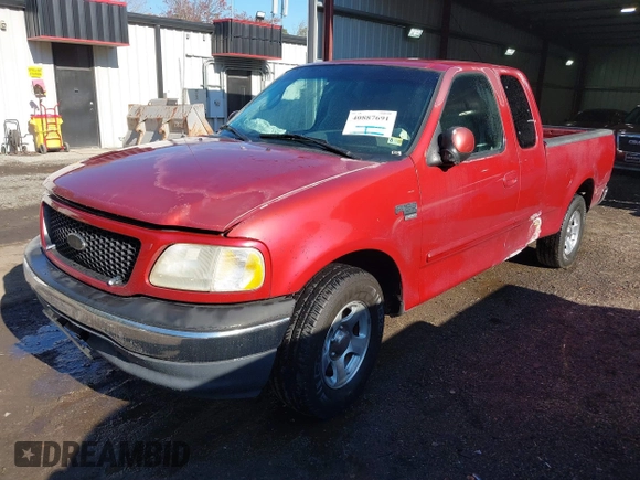 2000 Ford F-150 XL with VIN 1FTRX17L7YKA59717, listed as a IAAI auction lot 40887691 with 104,095 mi miles. Bid and sale history available at carsss.com. Image 17.