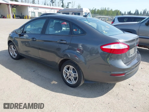 2018 Ford Fiesta SE with VIN 3FADP4BJ2JM101720, listed as a IAAI auction lot 42135936 with 122,061 mi miles. Bid and sale history available at carsss.com. Image 3.