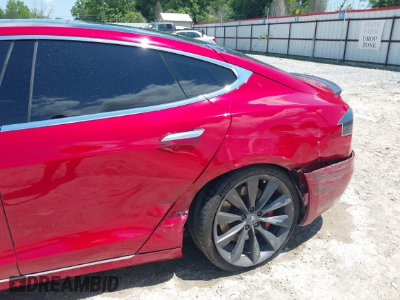 2016 Tesla Model S 90D with VIN 5YJSA1E48GF144821, listed as a IAAI auction lot 42206473 with 129,624 mi miles and . Bid and sale history available at DreamBid. Image 6.