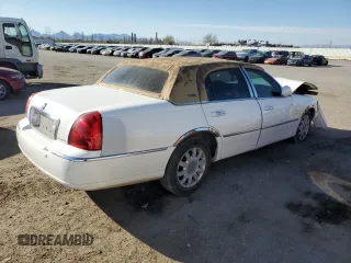 2005 Lincoln Town Car Signature Limited z VIN 1LNHM82W05Y613098, wystawiony jako Copart lot #45887385 z przebiegiem Nie podano mil oraz Szkoda całkowita • Salvage title. Historia ofert i sprzedaży dostępna na DreamBid. Obrazek 3.