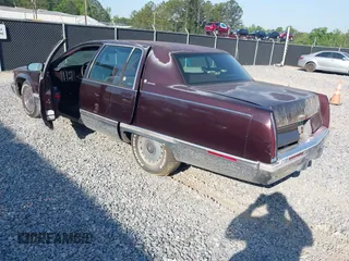 1996 Cadillac Fleetwood z VIN 1G6DW52PXTR713787, wystawiony jako IAAI lot #42079864 z przebiegiem Nie podano mil oraz . Historia ofert i sprzedaży dostępna na DreamBid. Obrazek 3.