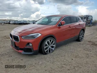 2018 BMW X2 sDrive28i with VIN WBXYJ3C37JEJ75893, listed as a Copart auction lot 62513565 with 62,029 mi miles and Salvage title. Bid and sale history available at DreamBid. Image 1.