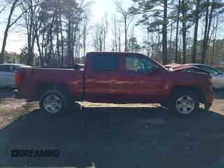 2018 Chevrolet Silverado 1500 LT with VIN 3GCUKREC4JG204672, listed as a IAAI auction lot 41638941 with 134,506 mi miles. Bid and sale history available at carsss.com. Image 13.