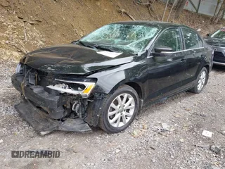 2014 Volkswagen Jetta SE z VIN 3VWD17AJ2EM273523, wystawiony jako IAAI lot #42360638 z przebiegiem 124 583 mil mil oraz . Historia ofert i sprzedaży dostępna na DreamBid. Obrazek 2.