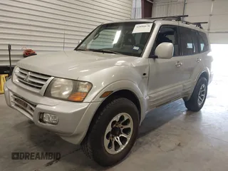 2002 Mitsubishi Montero Limited z VIN JA4MW51RX2J048087, wystawiony jako IAAI lot #42096678 z przebiegiem 218 795 mil mil oraz . Historia ofert i sprzedaży dostępna na DreamBid. Obrazek 2.