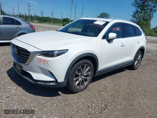2016 Mazda CX-9 Grand Touring with VIN JM3TCBDY7G0125708, listed as a IAAI auction lot 39891843 with 133,988 mi miles. Bid and sale history available at carsss.com. Image 2.