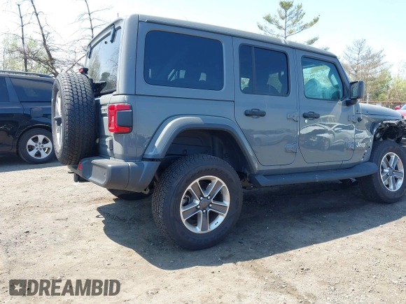 2022 Jeep Wrangler Unlimited Sahara with VIN 1C4HJXEM7NW206585, listed as a IAAI auction lot 42102516 with 10,769 mi miles and . Bid and sale history available at DreamBid. Image 4.