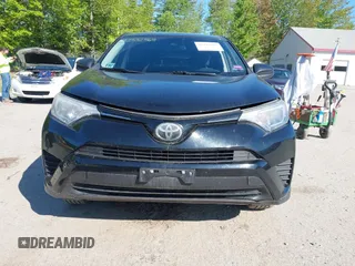 2018 Toyota RAV4 LE with VIN 2T3BFREV7JW717251, listed as a IAAI auction lot 42332563 with 120,193 mi miles and . Bid and sale history available at DreamBid. Image 13.