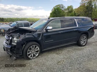 2015 Chevrolet Suburban LTZ with VIN 1GNSKKKC4FR119803, listed as a Copart auction lot 51416775 with 135,366 mi miles and Salvage Title. Bid and sale history available at DreamBid. Image 1.