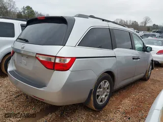 2011 Honda Odyssey LX with VIN 5FNRL5H20BB010579, listed as a IAAI auction lot 41217858 with 209,353 mi miles. Bid and sale history available at carsss.com. Image 4.
