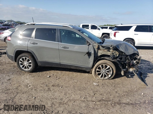 2020 Jeep Cherokee Latitude Plus with VIN 1C4PJLLBXLD581207, listed as a Copart auction lot 52283645 with 129,742 mi miles and Salvage Title. Bid and sale history available at carsss.com. Image 4.