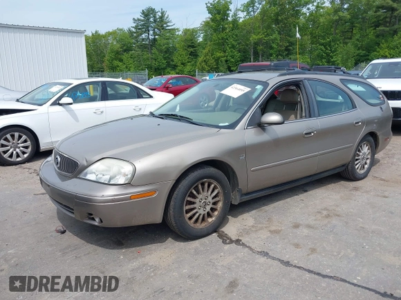 2004 Mercury Sable LS Premium z VIN 1MEHM59S34A626679, wystawiony jako IAAI lot #42364055 z przebiegiem 98 760 mil mil oraz . Historia ofert i sprzedaży dostępna na DreamBid. Obrazek 2.
