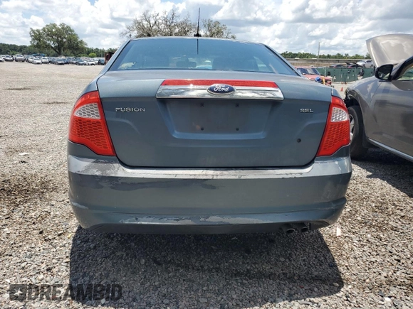 2012 Ford Fusion SEL z VIN 3FAHP0JA6CR295220, wystawiony jako Copart lot #62064665 z przebiegiem 145 191 mil mil oraz Szkoda całkowita • Salvage title. Historia ofert i sprzedaży dostępna na DreamBid. Obrazek 6.