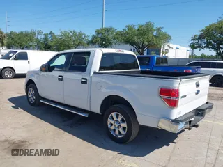 2013 Ford F-150 XL with VIN 1FTFW1CT1DFA78052, listed as a IAAI auction lot 42033387 with 116,264 mi miles. Bid and sale history available at carsss.com. Image 3.