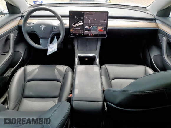 2023 Tesla Model 3 with VIN 5YJ3E1EA1PF550454, listed as a Copart auction lot 58985695 with 19,199 mi miles and Salvage title. Bid and sale history available at DreamBid. Image 8.