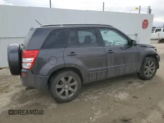 2012 Suzuki Grand Vitara Limited z VIN JS3TD0D74C4100965, wystawiony jako Copart lot #52727894 z przebiegiem 150 760 mil mil oraz Szkoda całkowita • Salvage title. Historia ofert i sprzedaży dostępna na DreamBid. Obrazek 3.