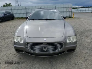 2005 Maserati Quattroporte z VIN ZAMCE39A050017377, wystawiony jako Copart lot #50191415 z przebiegiem 39 545 mil mil oraz Czysty tytuł • Clean title. Historia ofert i sprzedaży dostępna na DreamBid. Obrazek 5.