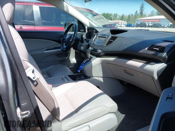2014 Honda CR-V EX-L with VIN 5J6RM4H79EL077096, listed as a IAAI auction lot 42153513 with 104,972 mi miles and . Bid and sale history available at DreamBid. Image 5.