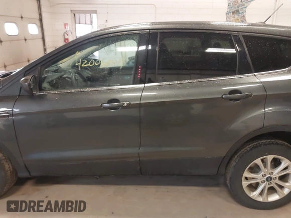 2017 Ford Escape SE with VIN 1FMCU9G90HUC96633, listed as a IAAI auction lot 42005904 with 93,139 mi miles. Bid and sale history available at carsss.com. Image 14.