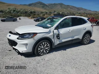 2020 Ford Escape Titanium Hybrid with VIN 1FMCU9DZ9LUC30255, listed as a Copart auction lot 59558215 with 46,303 mi miles and Salvage title. Bid and sale history available at DreamBid. Image 1.