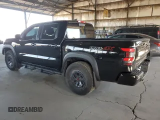 2025 Nissan Frontier S with VIN 1N6ED1EK6SN623961, listed as a Copart auction lot 57083555 with 4,720 mi miles and Salvage title. Bid and sale history available at DreamBid. Image 2.