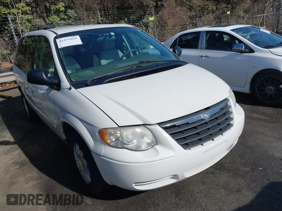 2006 Chrysler Town & Country Touring with VIN 2A8GP54L56R671585, listed as a IAAI auction lot 41475419 with 166,861 mi miles and . Bid and sale history available at DreamBid. Image 1.