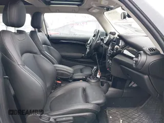 2020 MINI Hardtop Cooper S z VIN WMWXR5C07L2L60692, wystawiony jako IAAI lot #41621462 z przebiegiem 66 898 mil mil oraz . Historia ofert i sprzedaży dostępna na DreamBid. Obrazek 5.