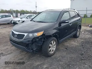 2012 Kia Sorento LX with VIN 5XYKT4A22CG273527, listed as a IAAI auction lot 41954603 with 309,018 mi miles. Bid and sale history available at carsss.com. Image 2.