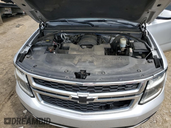 2016 Chevrolet Tahoe LS with VIN 1GNSCAKC7GR292272, listed as a Copart auction lot 54091975 with 221,137 mi miles and Salvage title. Bid and sale history available at DreamBid. Image 11.