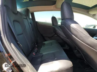 2018 Tesla Model 3 Long Range Battery z VIN 5YJ3E1EBXJF073250, wystawiony jako Copart lot #55832885 z przebiegiem 50 196 mil mil oraz Szkoda całkowita • Salvage title. Historia ofert i sprzedaży dostępna na DreamBid. Obrazek 10.