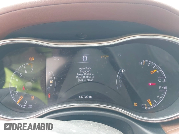 2015 Jeep Grand Cherokee Summit with VIN 1C4RJFJGXFC882787, listed as a IAAI auction lot 42098274 with 147,020 mi miles and . Bid and sale history available at DreamBid. Image 7.