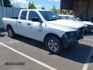 2024 Ram 1500 Classic SLT with VIN 1C6RR6GG4RS135980, listed as a IAAI auction lot 42086911 with 31,001 mi miles. Bid and sale history available at carsss.com. Image 1.