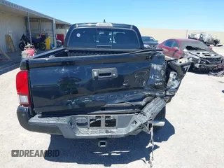 2018 Toyota Tacoma SR5 with VIN 3TMBZ5DN1JM014540, listed as a IAAI auction lot 42505324 with 112,990 mi miles and . Bid and sale history available at DreamBid. Image 16.
