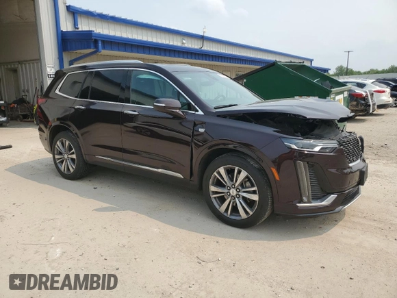 2020 Cadillac XT6 AWD Premium Luxury with VIN 1GYKPDRS4LZ129224, listed as a Copart auction lot 60328745 with 76,290 mi miles and Salvage title. Bid and sale history available at DreamBid. Image 4.