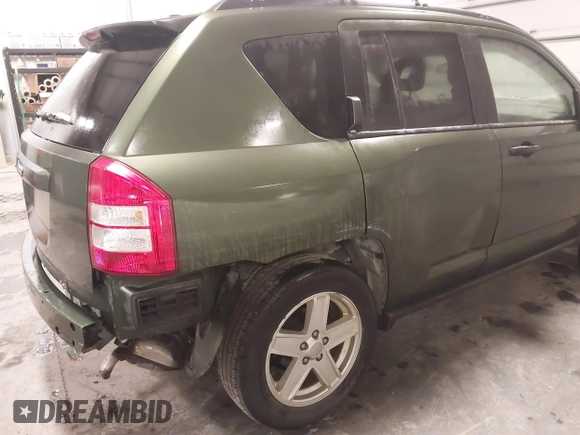 2007 Jeep Compass Sport with VIN 1J8FT47W77D221755, listed as a IAAI auction lot 41826458 with 205,072 mi miles. Bid and sale history available at carsss.com. Image 6.