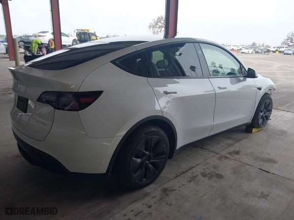 2024 Tesla Model Y Long Range with VIN 7SAYGDEE0RF124894, listed as a IAAI auction lot 41530342 with NaN miles. Bid and sale history available at carsss.com. Image 4.