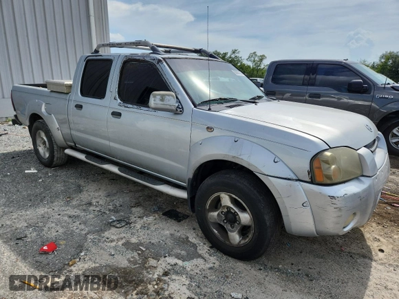 2002 Nissan Frontier XE with VIN 1N6ED29X82C340808, listed as a Copart auction lot 63927075 with 306,615 mi miles and Clean title. Bid and sale history available at DreamBid. Image 4.