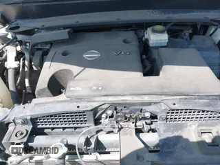 2014 Nissan Pathfinder SV with VIN 5N1AR2MM7EC703101, listed as a IAAI auction lot 42221242 with 178,237 mi miles and . Bid and sale history available at DreamBid. Image 10.