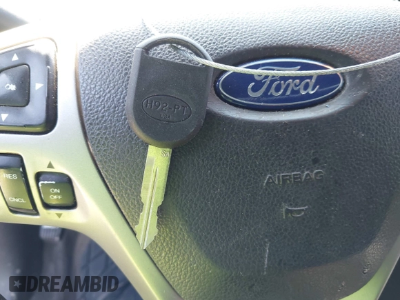 2013 Ford Taurus SEL with VIN 1FAHP2E83DG111766, listed as a IAAI auction lot 42041504 with 158,468 mi miles. Bid and sale history available at carsss.com. Image 11.
