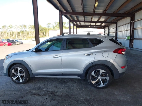 2017 Hyundai Tucson Value with VIN KM8J33A27HU418441, listed as a IAAI auction lot 41812422 with 111,406 mi miles. Bid and sale history available at carsss.com. Image 14.