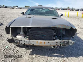 2011 Dodge Challenger z VIN 2B3CJ4DG9BH570202, wystawiony jako Copart lot #73284844 z przebiegiem 217 850 mil mil oraz Szkoda całkowita • Salvage title. Historia ofert i sprzedaży dostępna na DreamBid. Obrazek 5.