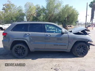 2020 Jeep Grand Cherokee Laredo E with VIN 1C4RJEAG3LC247027, listed as a IAAI auction lot 42538279 with 97,601 mi miles and . Bid and sale history available at DreamBid. Image 13.