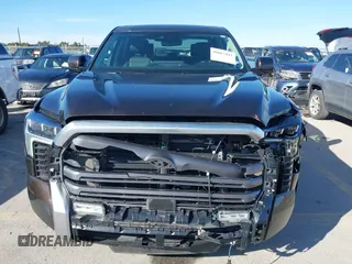 2023 Toyota Tundra Limited Hybrid with VIN 5TFJC5DB7PX032210, listed as a IAAI auction lot 41667443 with 18,390 mi miles and . Bid and sale history available at DreamBid. Image 6.